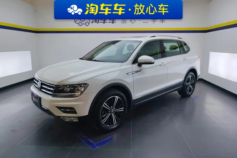 Volkswagen Tiguan L — фото 1