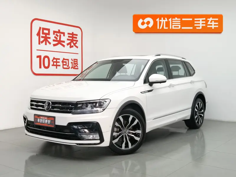 Volkswagen Tiguan L — фото 1